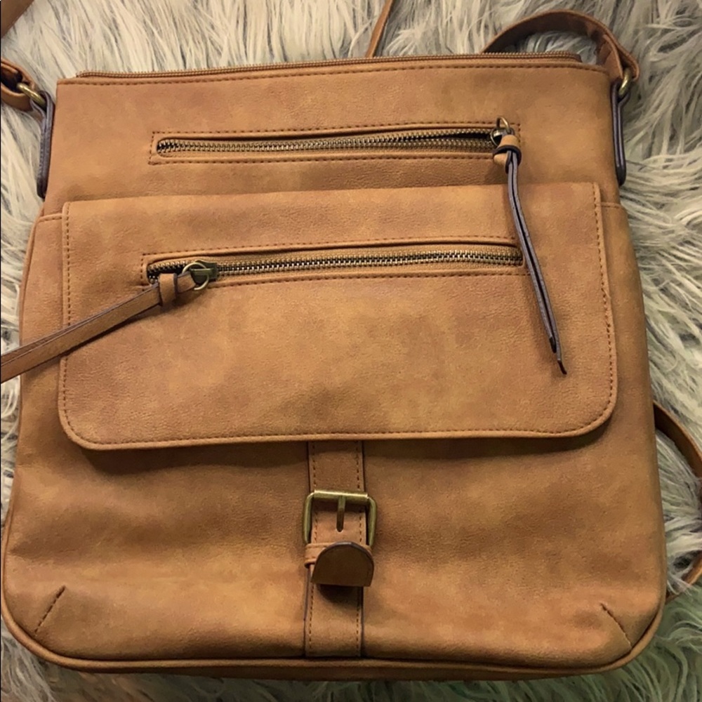 BRAND NEW Cross body leather look camel brown.